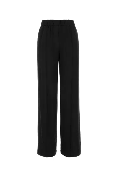 Loewe Wide-leg Wool Trousers With Central Pleats In Black