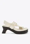 Loewe Ease 70 Oversized Buckle Suede Sandals In White