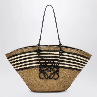 LOEWE LARGE ANAGRAM BASKET BAG IN IRACA PALM AND LEATHER