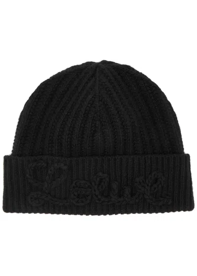 Loewe Logo-appliqué Ribbed Wool Beanie In Black