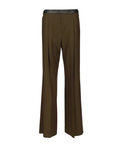 Loewe Logo Embossed Pleat Detail Trousers In Green