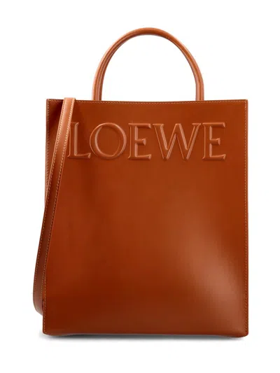 Loewe Logo Embossed Tote Bag In Brown
