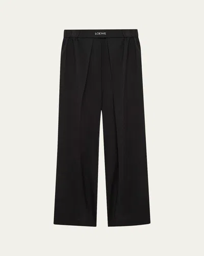 Loewe Logo Waist Asymmetric Pleated Pants In Black