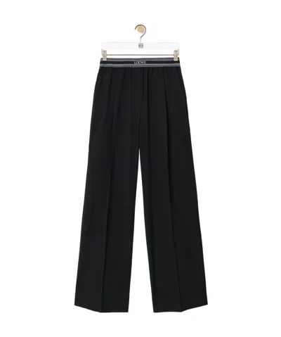 Loewe Logo Waist Loose Leg Trousers In Black