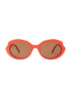 Loewe Oval Sunglasses In Shiny Orange/brown