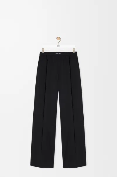 Loewe Wool Trousers With Wide Leg And Elastic Waistband In Black