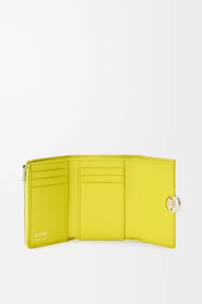 Loewe Pebble Small Vertical Wallet In Ostrich For Woman In Lemon