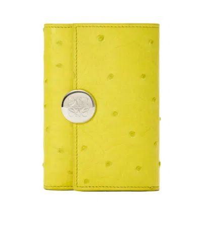 Loewe Pebble Small Vertical Wallet In Ostrich In Lemon