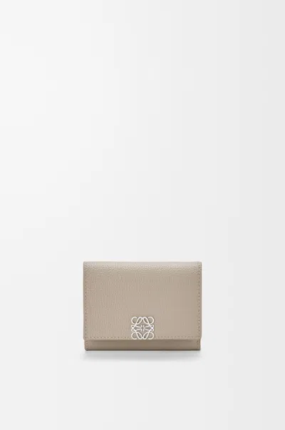 Loewe Anagram Trifold Wallet In Pebble Grained Calfskin In Brown
