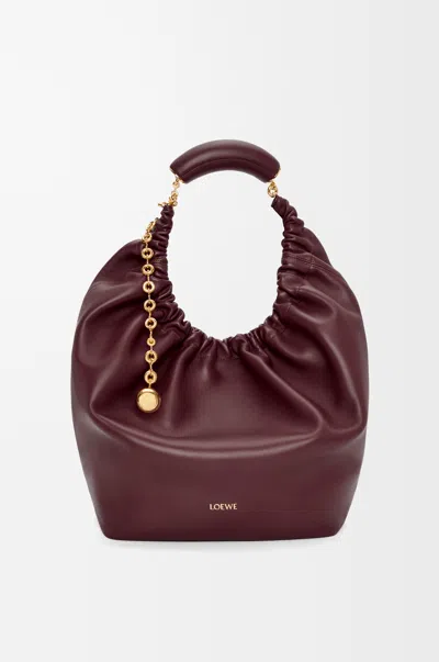 Loewe Medium Squeeze Bag In Mellow Nappa Lambskin For Woman In Burgundy