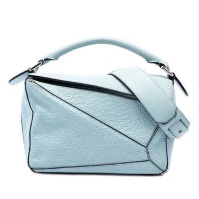 Pre-owned Loewe Small Anagram Embossed Calfskin Puzzle Satchel In Blue