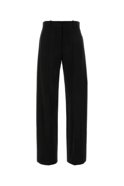 Loewe Trousers In Transparent