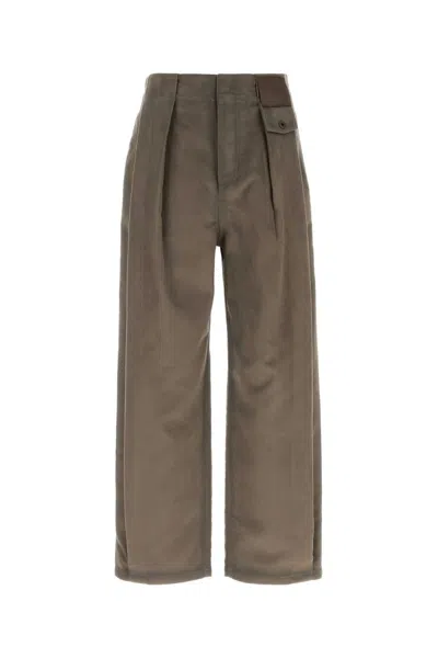 Loewe Pleated Logo-patch Trousers In Brown