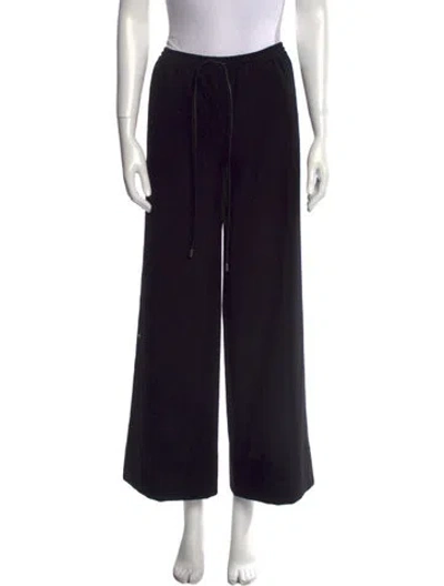 Pre-owned Loewe Wool Wide Leg Pants In Black