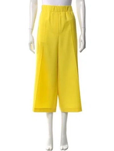 Pre-owned Loewe Wool Wide Leg Pants In Yellow