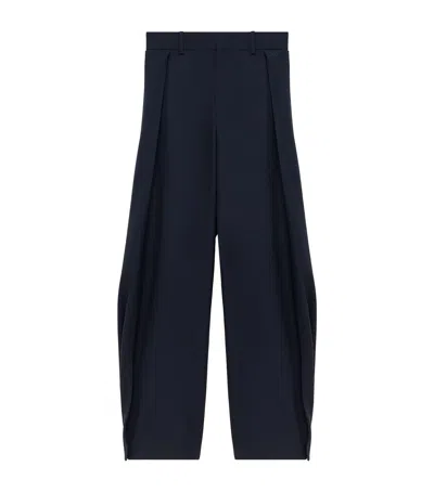 Loewe Wool-blend Pleated Trousers In Navy