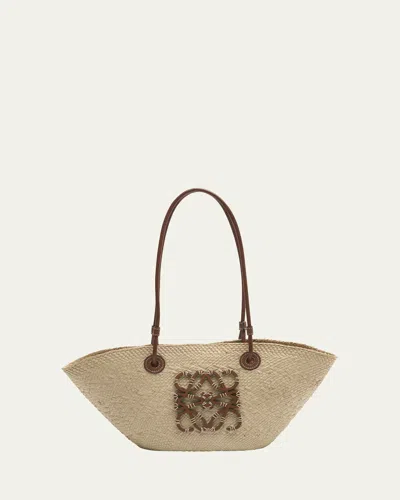 Loewe X Paula's Ibiza Anagram Small Basket Bag In Iraca Palm With Leather Handles In Brown