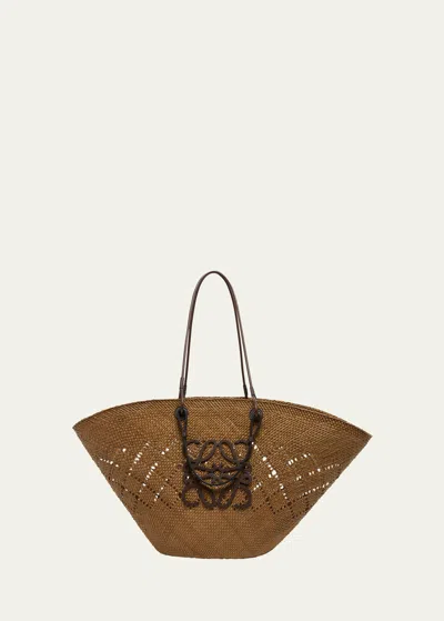 Loewe X Paula's Ibiza Large Anagram Basket Tote Bag In Iraca Palm With Leather Handles In Brown