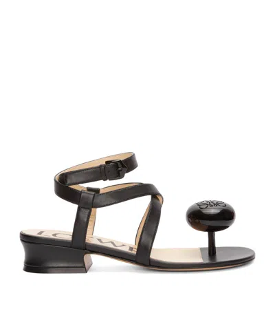 Loewe Calle Pebble Leather Toe-post Sandals In Black