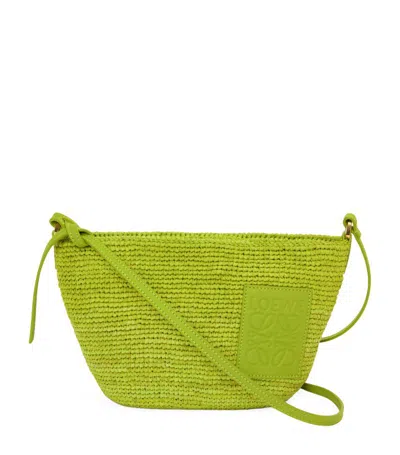 Loewe X Paula's Ibiza Slit Pochette Bag In Raffia With Leather Strap In Meadow Green