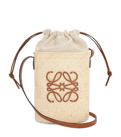 Loewe X Paula's Ibiza Straw Bucket Bag In Beige