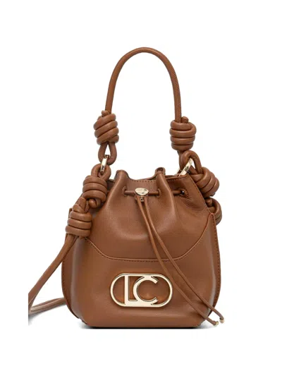 Lola Casademunt Knot-detail Logo-plaque Bucket Bag In Brown