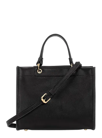 Longchamp Black Handbag With Embossed Logo On The Front And Adjustable And Removable Shoulder Strap In Leather