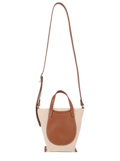 Longchamp Canvas Bucket Bag With Crossbody Strap In Brown