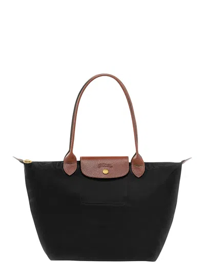 Longchamp Le Pilage Original Black Medium Tote Bag With Two Top Handles And Embossed Logo On The Front In Canv