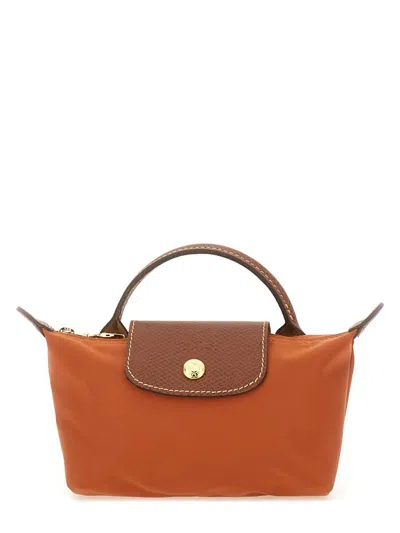 Longchamp Le Pliage Clutch Bag With Handle In Brown