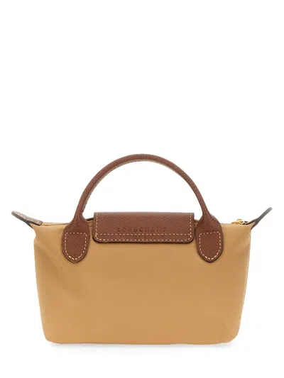 Longchamp Le Pliage Clutch In Beige