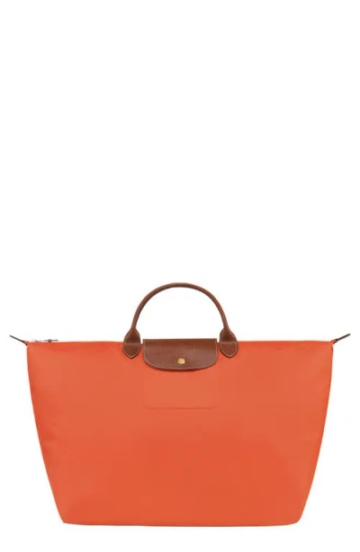Longchamp 'le Pliage' Overnighter In Orange