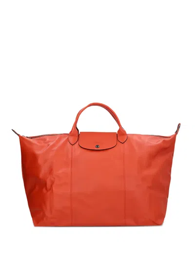 Longchamp Leather Top-handle Luggage In Red