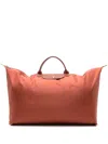 Longchamp Medium Le Pliage Holdall In Orange
