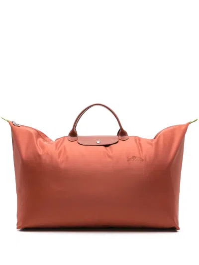 Longchamp Medium Le Pliage Holdall In Orange