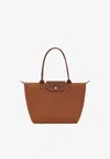 Longchamp Medium Le Pliage Original Bag In Brown