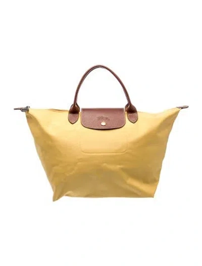 Pre-owned Longchamp Nylon Le Pliage In Yellow
