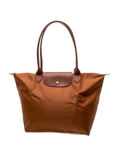 Pre-owned Longchamp Nylon Tote In Brown
