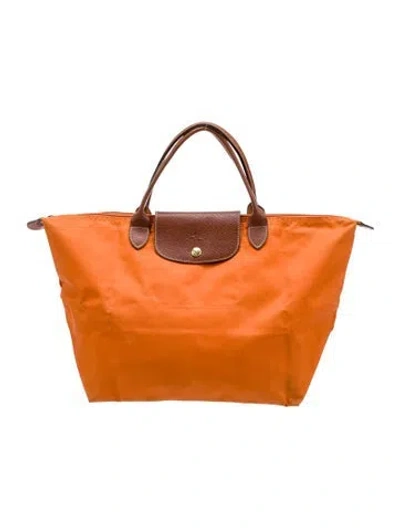 Pre-owned Longchamp Nylon Tote In Orange