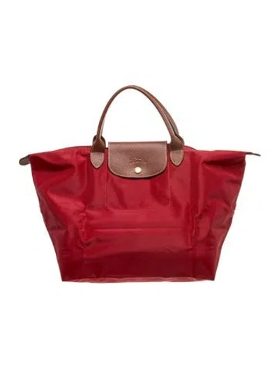 Pre-owned Longchamp Nylon Tote In Orange
