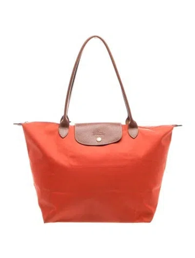 Pre-owned Longchamp Nylon Tote In Orange