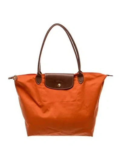 Pre-owned Longchamp Nylon Tote In Orange