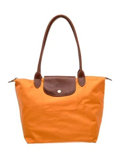 Pre-owned Longchamp Nylon Tote In Orange