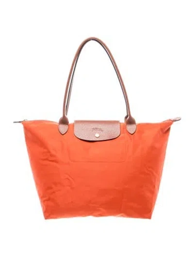 Pre-owned Longchamp Nylon Tote In Orange