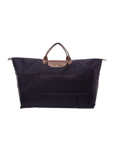 Pre-owned Longchamp Nylon Weekender Bag In Purple