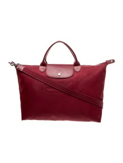 Pre-owned Longchamp Nylon Weekender Bag In Red