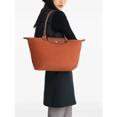 Longchamp Orange Tote Bags