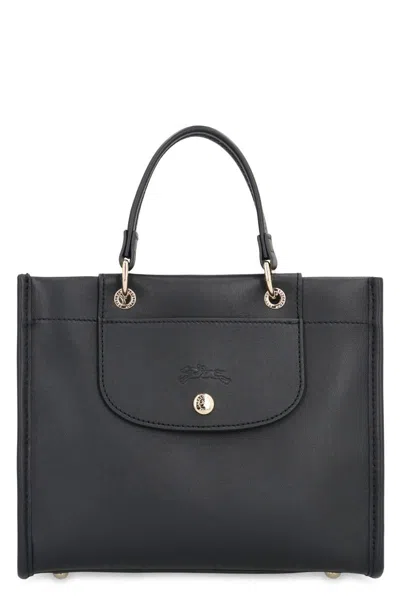 Longchamp Black Handbag With Embossed Logo On The Front And Adjustable And Removable Shoulder Strap In Leather