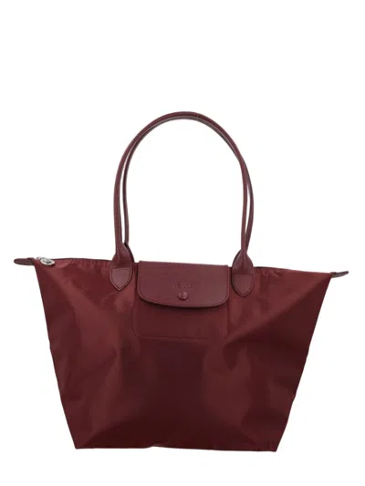 Longchamp Spacious Trapezoidal Tote Bag With Dual Handles And Zippered Closure In Black