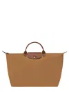Longchamp Spacious Travel Bag With Structured Silhouette And Leather Accents In Brown
